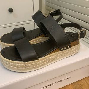 Black leather Steve Madden wedge sandals. Excellent condition!